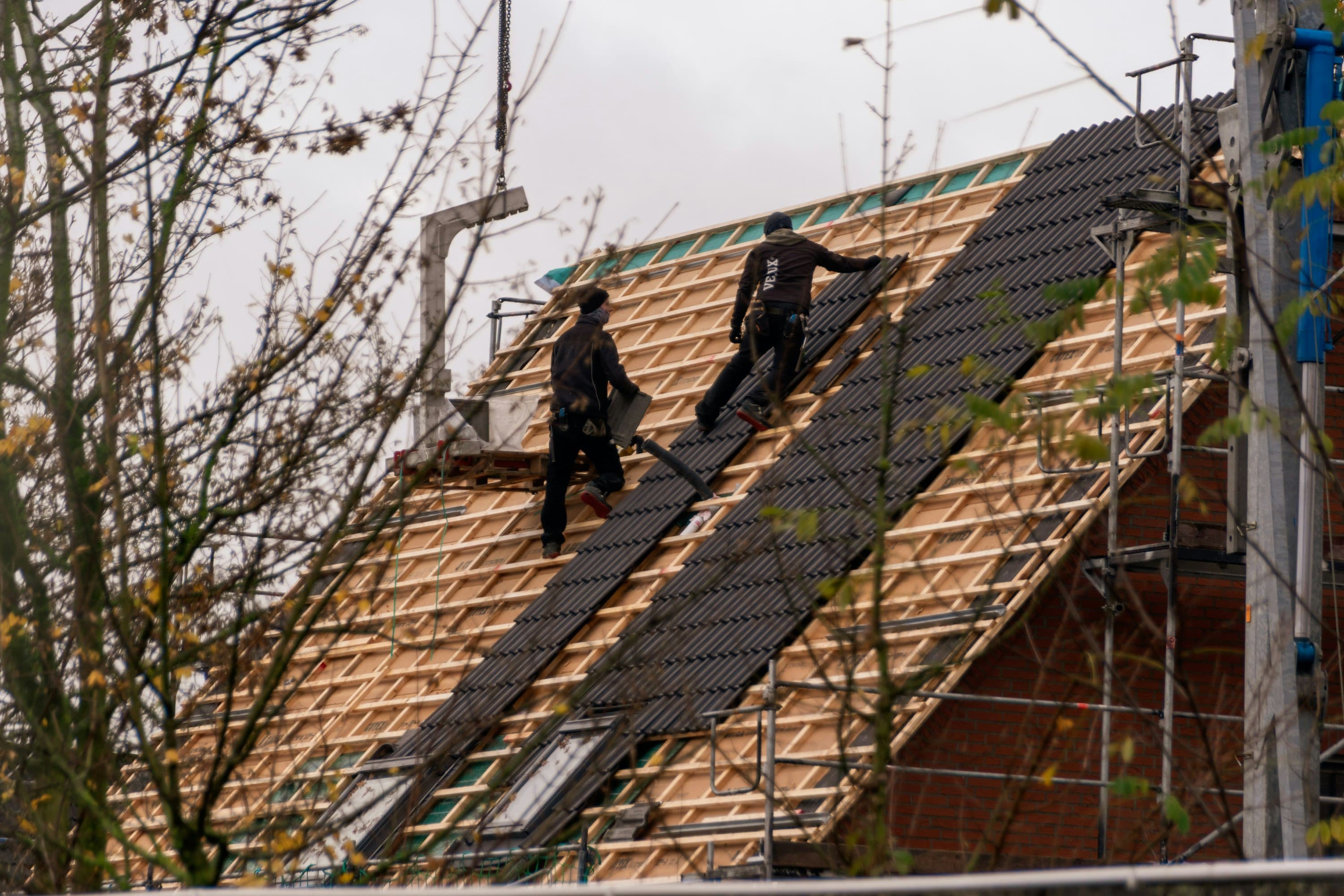 Roofing crew on a job site